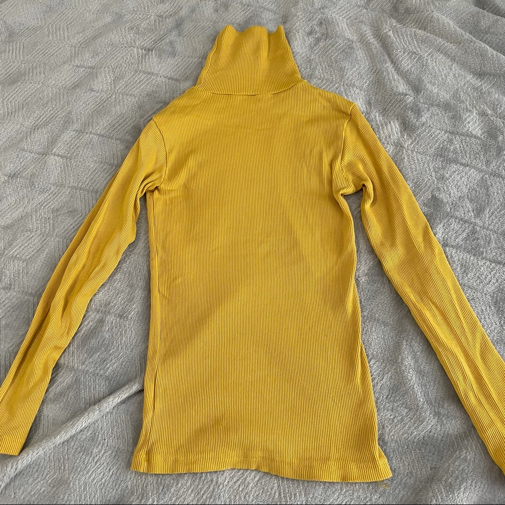 Yellow turtleneck